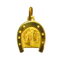 Gold plated horseshoe medal at the "Apparition"